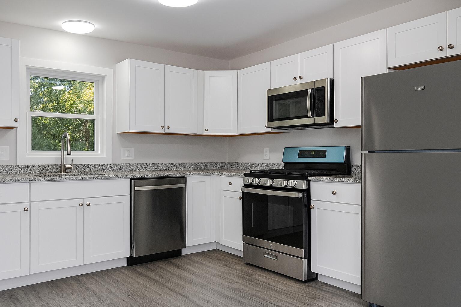 3332 Hillis Road Augusta, GA 30906 - Photo 12 of 32 Brand New Stainless Steel Gas range (5 burners), Built-In Microwave, dishwasher, and refrigerator