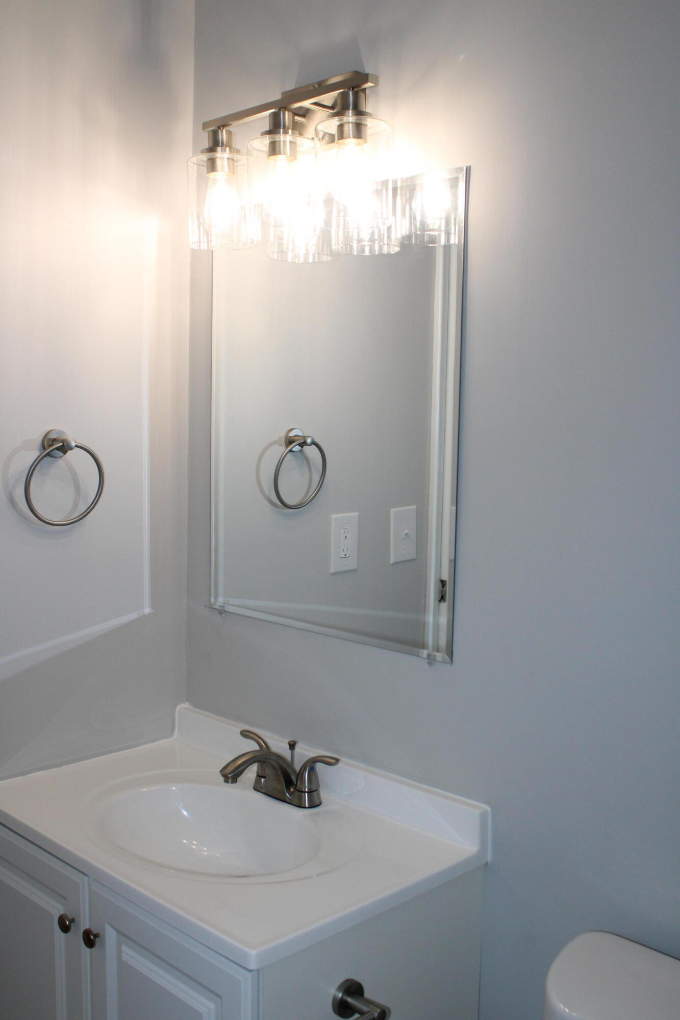 3332 Hillis Road Augusta, GA 30906 - Photo 21 of 32 New vanity, mirror and light fixture.