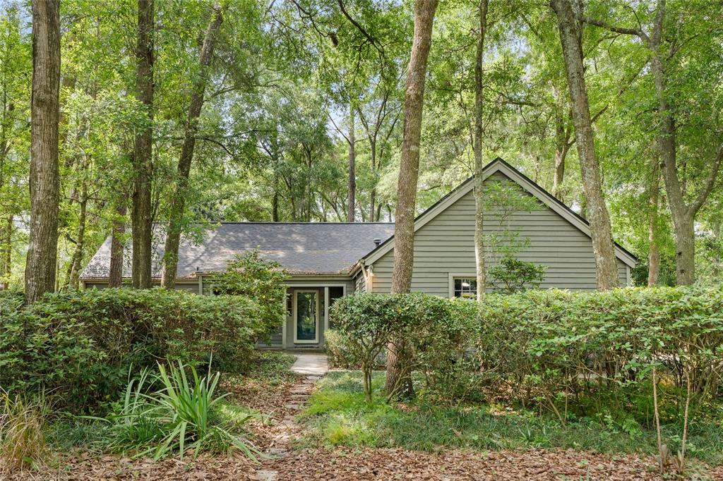 8431 Southwest 55 Place Gainesville, FL 32608 - Photo 1 of 1 a front view of a house with a yard