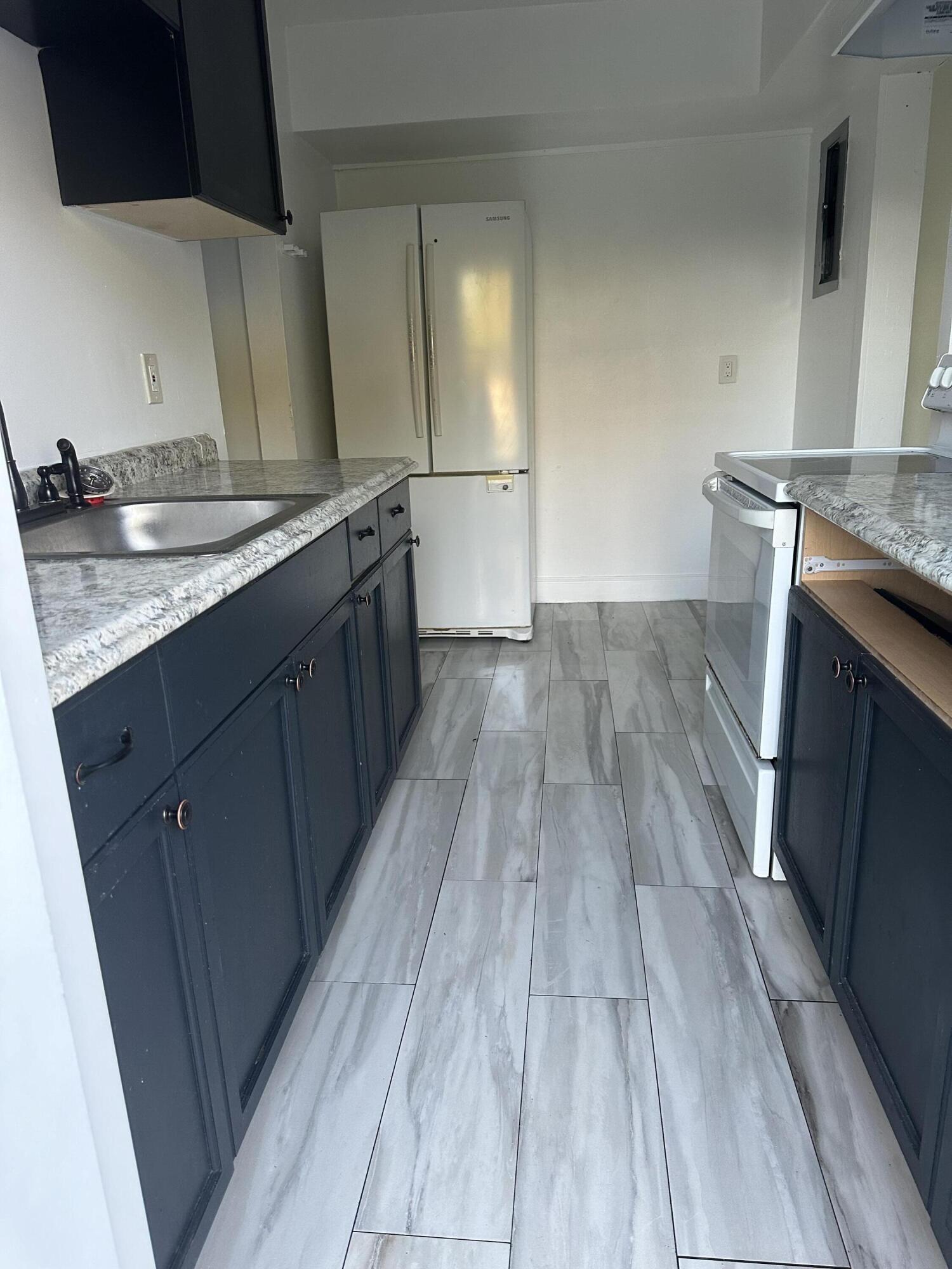 1119 Ave F, Unit B Fort Pierce, FL 34950 - Photo 3 of 7 IMG_6190