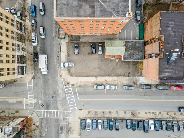 a picture of a brick building with many windows
