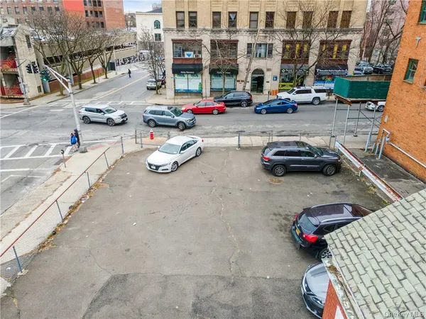 a couple of cars parked in a parking lot