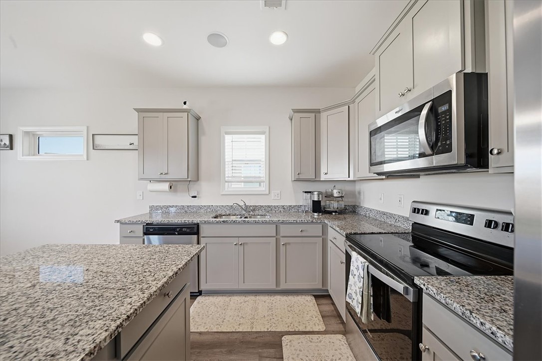403 Seaborn Circle Pendleton, SC 29670 - Photo 14 of 47 This kitchen showcases ample granite countertops, a central island, and modern stainless steel appliances.