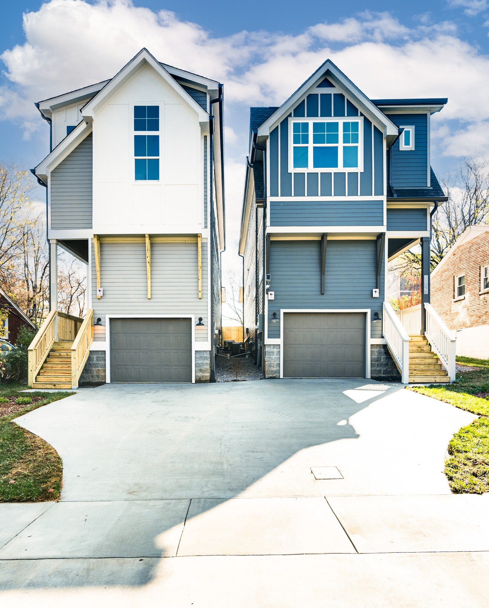 a front view of a house with garage