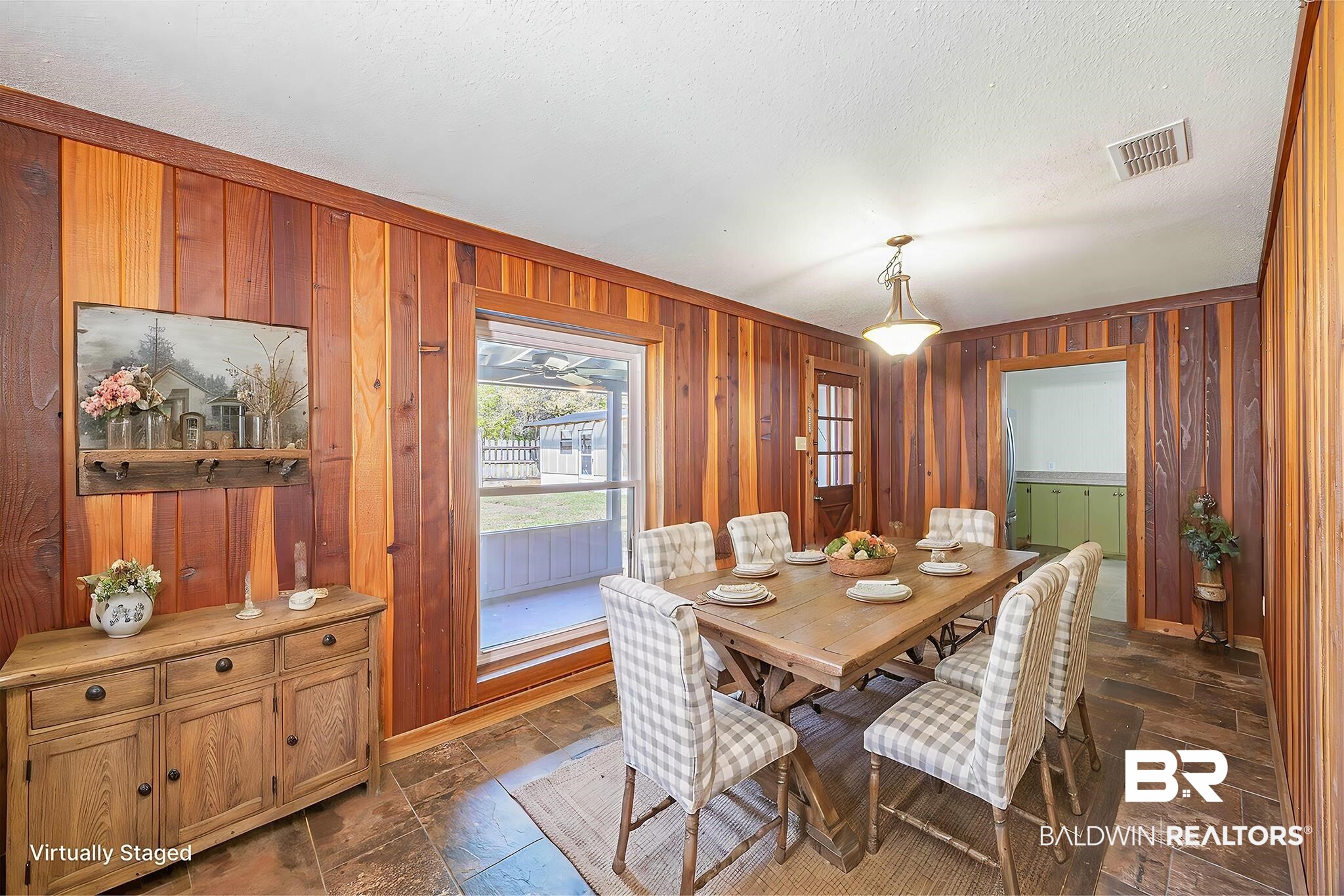 43101 Brown Road Bay Minette, AL 36507 - Photo 80 of 81 Dining area featuring stone tile flooring and wood walls