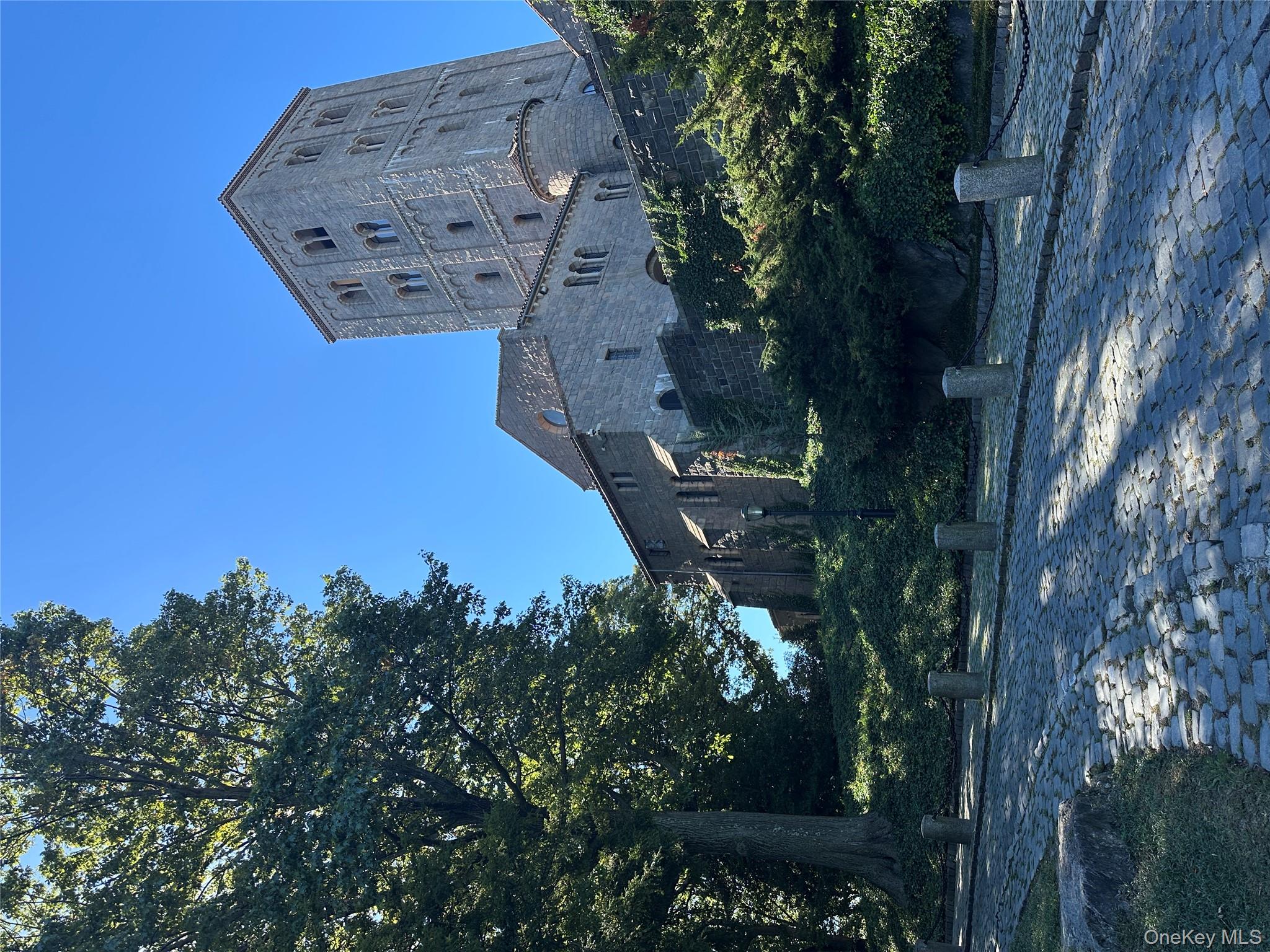 295 Bennett Avenue, Unit 4B Manhattan, NY 10040 - Photo 14 of 18 a view of a street in front of a house