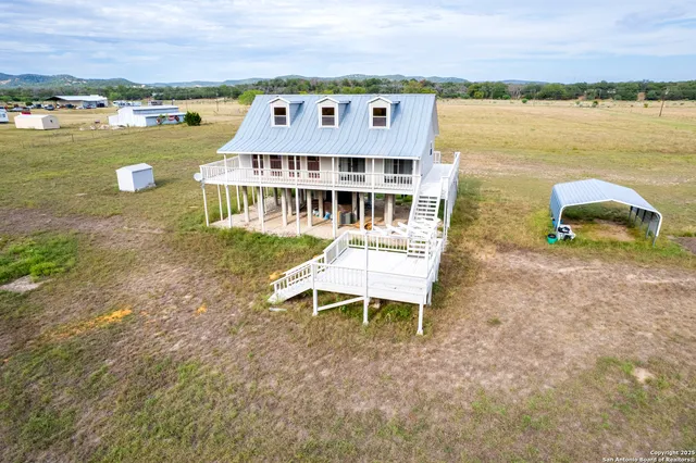 a front view of a house with ocean view