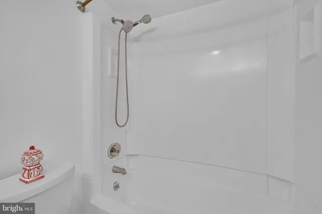 a view of small space with racks on the wall