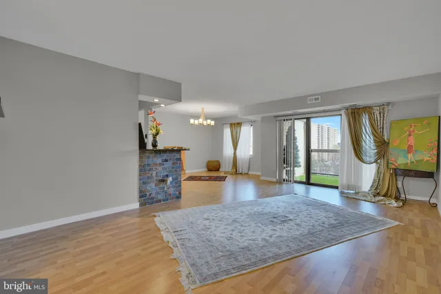 a view of a living room and dining room