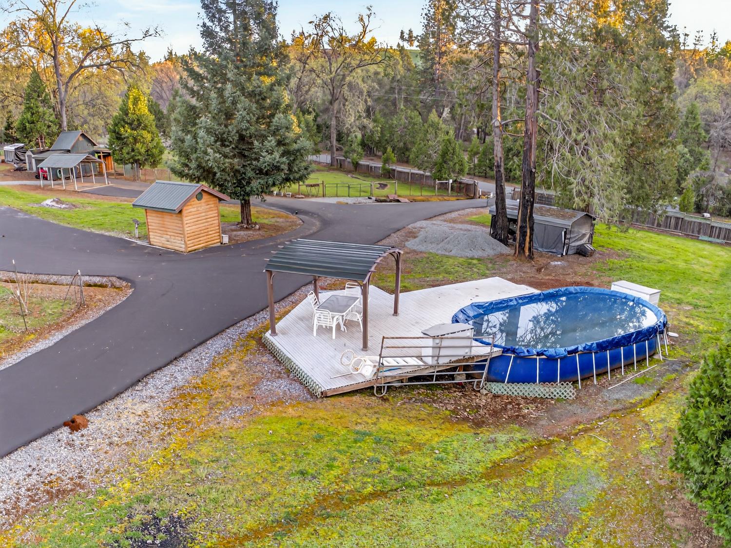 10394 Ponderosa Way Mountain Ranch, CA 95246 - Photo 46 of 58 swimming pool with outdoor seating