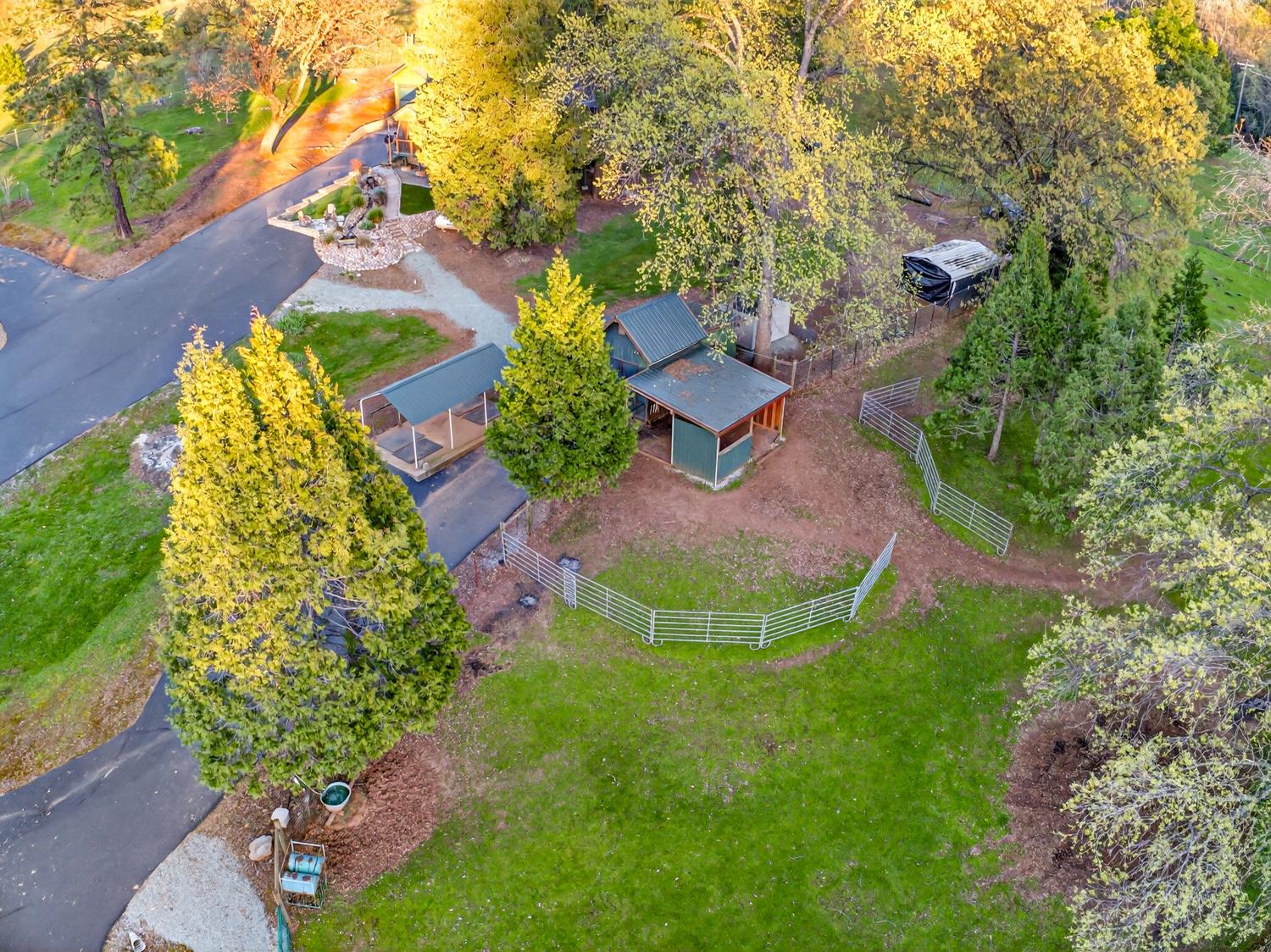10394 Ponderosa Way Mountain Ranch, CA 95246 - Photo 49 of 58 an aerial view of a house with garden space and street view