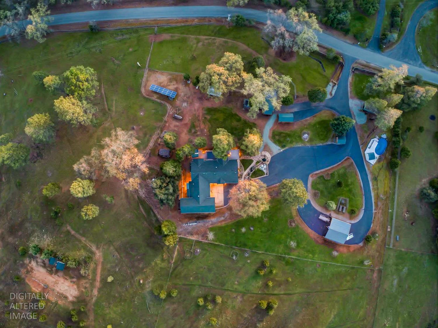 10394 Ponderosa Way Mountain Ranch, CA 95246 - Photo 51 of 58 a vase of flowers sitting on a table