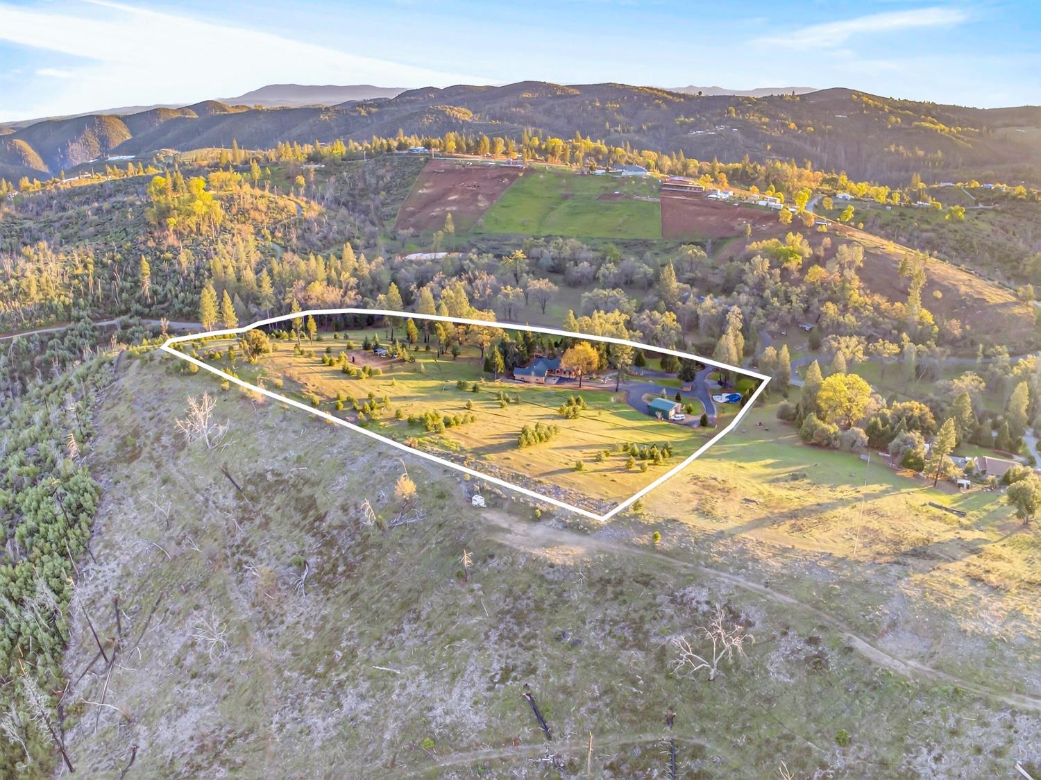 10394 Ponderosa Way Mountain Ranch, CA 95246 - Photo 54 of 58 a view of a lake with a mountain