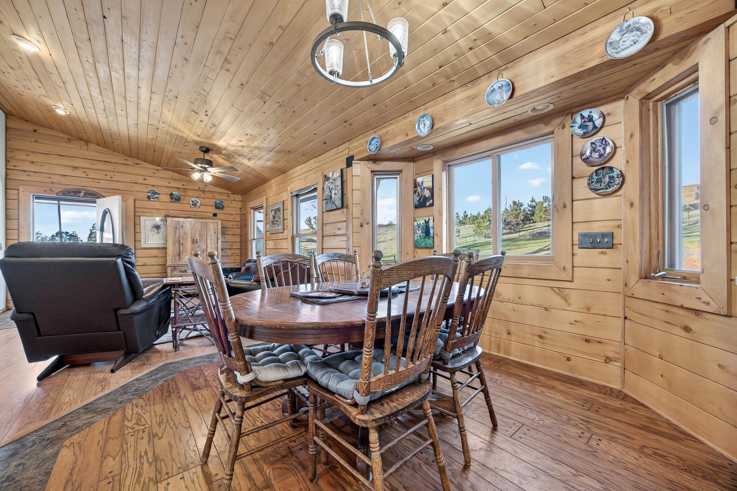 10394 Ponderosa Way Mountain Ranch, CA 95246 - Photo 9 of 58 a view of a dining room with furniture window and wooden floor