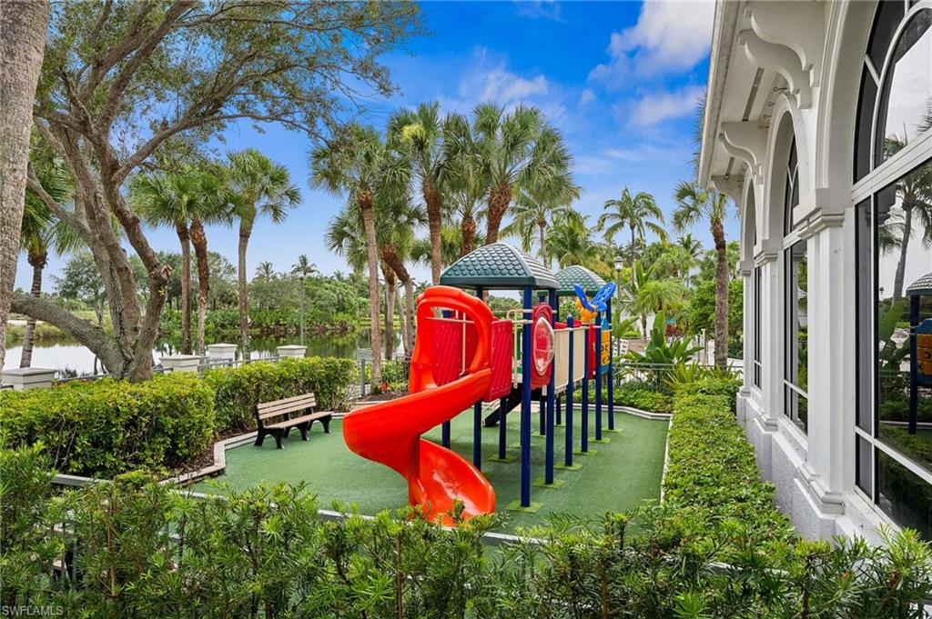 8355 Whisper Trace Lane, Unit K104 Naples, FL 34114 - Photo 18 of 21 an aerial view of a house with swimming pool and garden