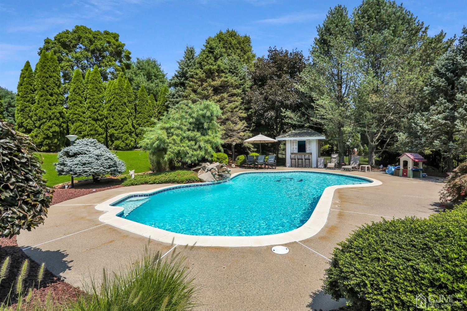 2 Astor Drive Manalapan, NJ 07726 - Photo 13 of 60 a view of outdoor space yard swimming pool and patio