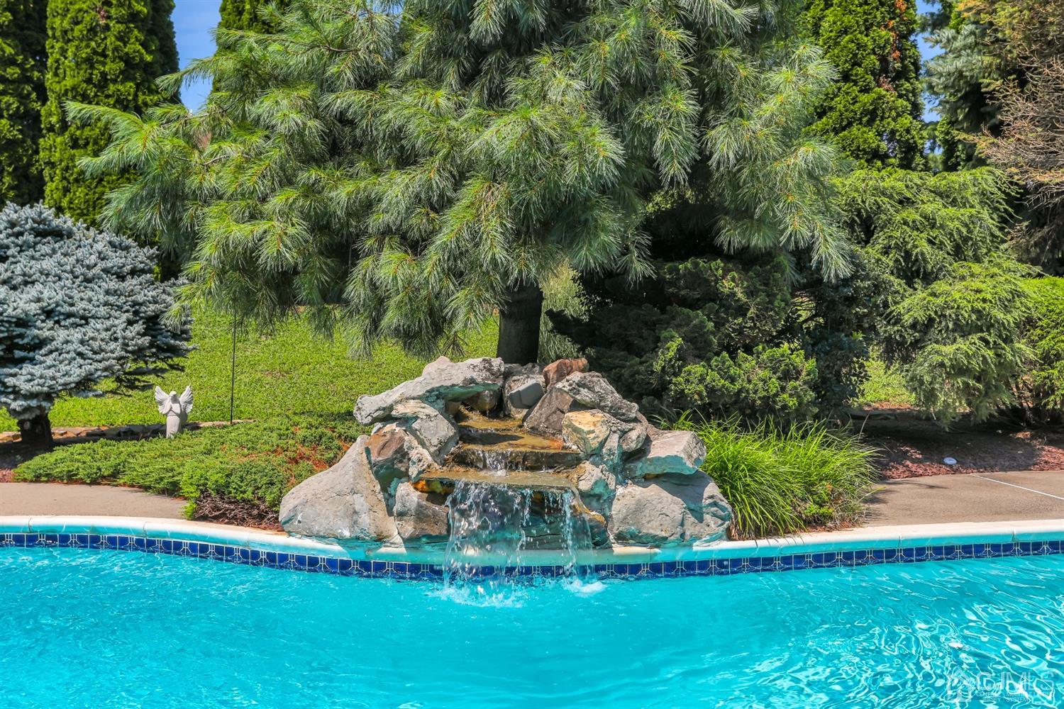 2 Astor Drive Manalapan, NJ 07726 - Photo 15 of 60 a view of a backyard