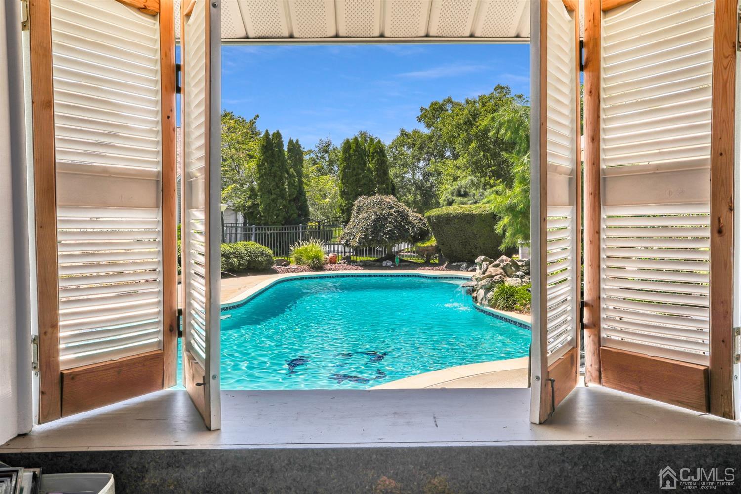 2 Astor Drive Manalapan, NJ 07726 - Photo 17 of 60 a view of a back yard of the house