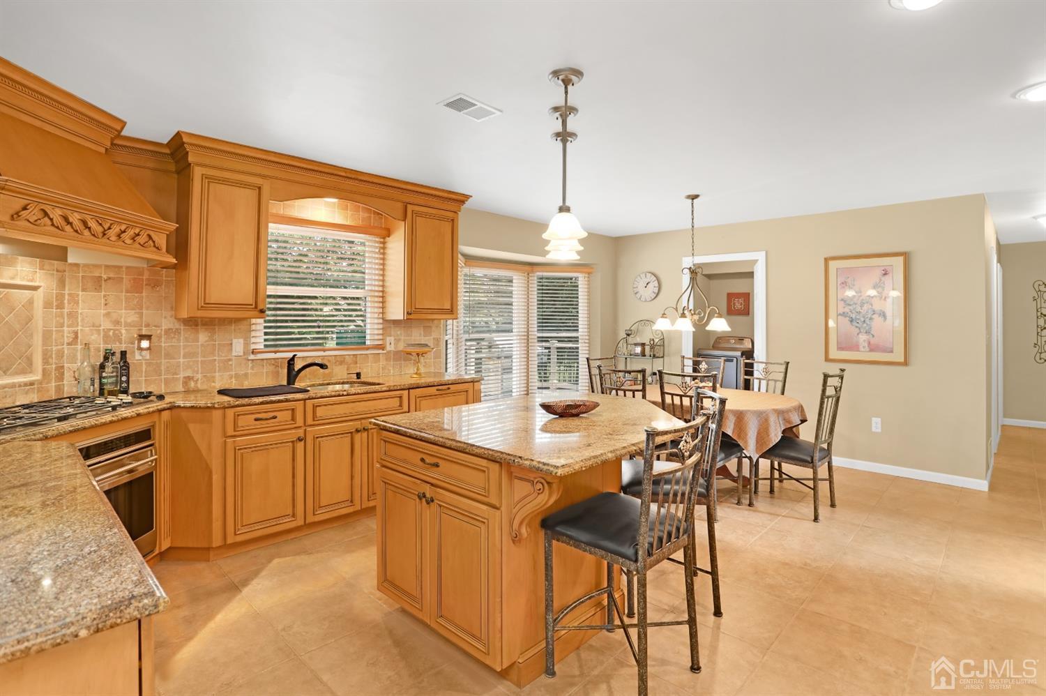 2 Astor Drive Manalapan, NJ 07726 - Photo 25 of 60 a very nice looking kitchen with a large window