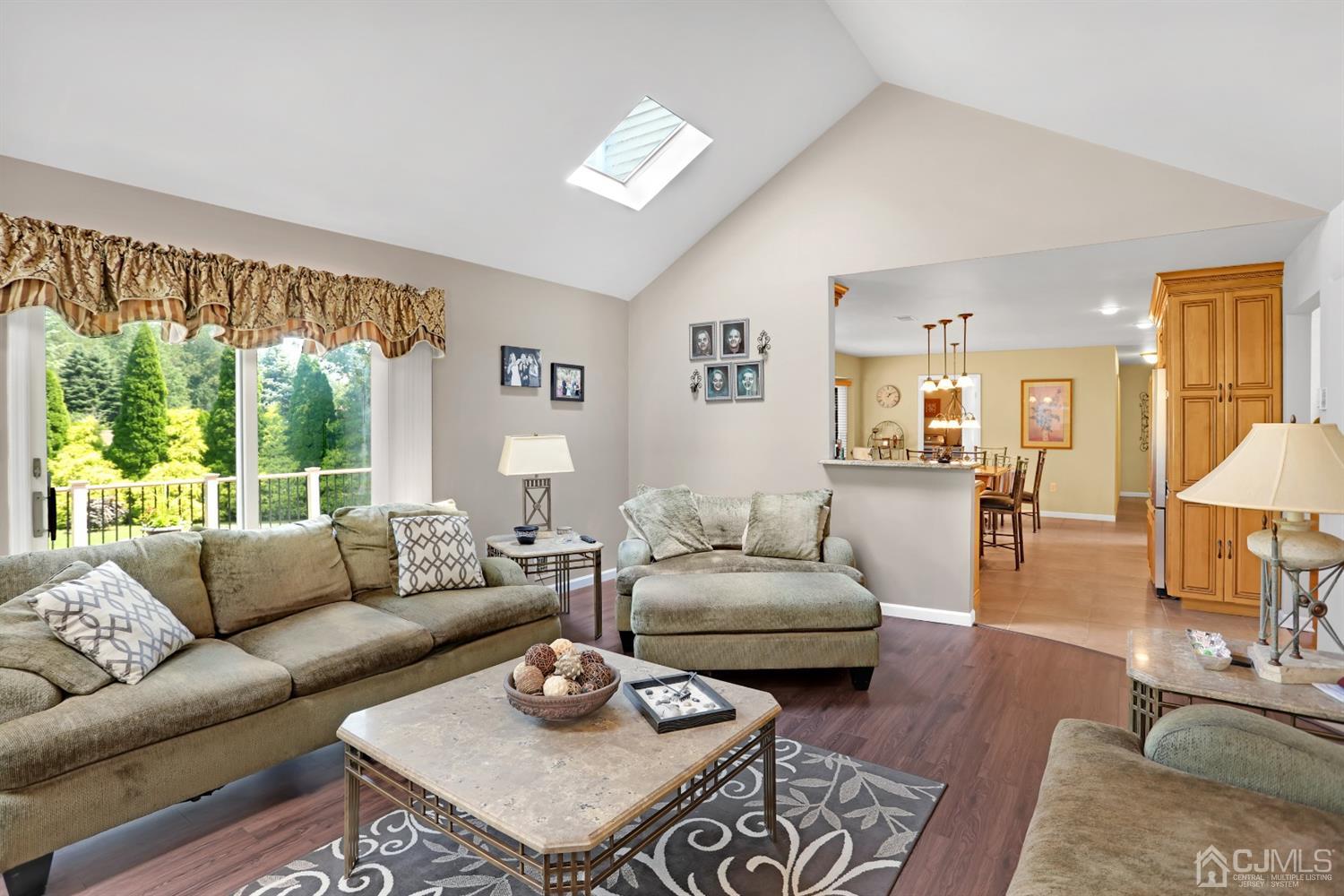 2 Astor Drive Manalapan, NJ 07726 - Photo 30 of 60 a living room with furniture and a large window