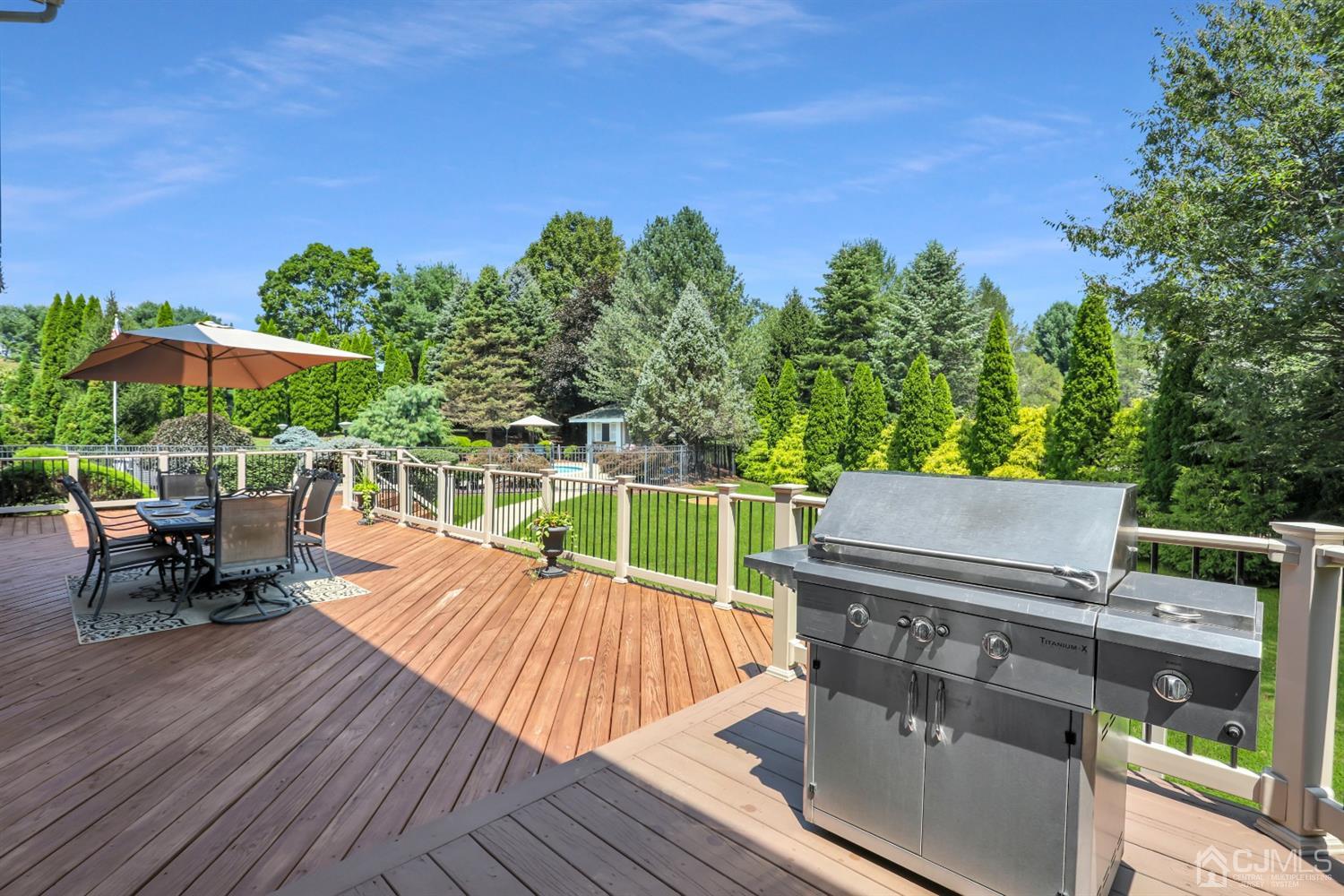 2 Astor Drive Manalapan, NJ 07726 - Photo 38 of 60 a view of a patio with wooden floor