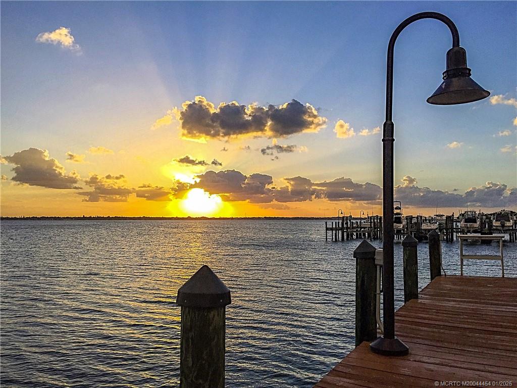 4540 Northeast Sandpebble Trace, Unit 105 Stuart, FL 34996 - Photo 30 of 39 a view of a terrace with skyline