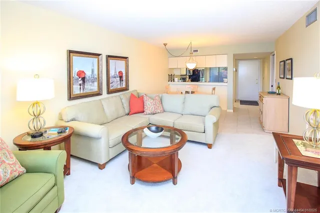 a living room with furniture and a couch