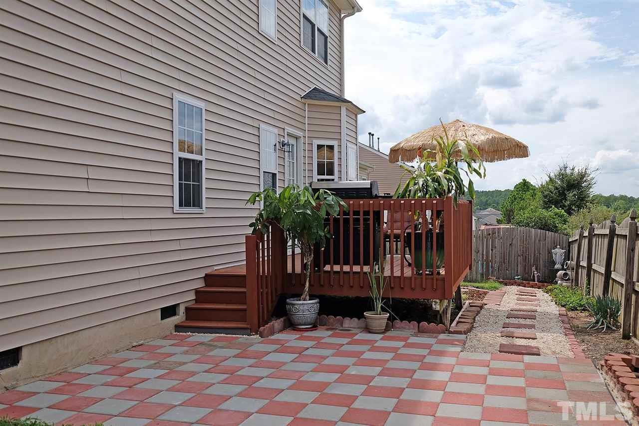 613 Hanson Road Durham, NC 27713 - Photo 24 of 25 a view of a house with wooden fence