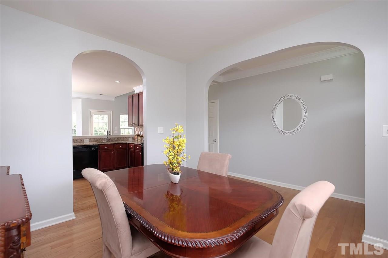 613 Hanson Road Durham, NC 27713 - Photo 3 of 25 a dining room with furniture and window