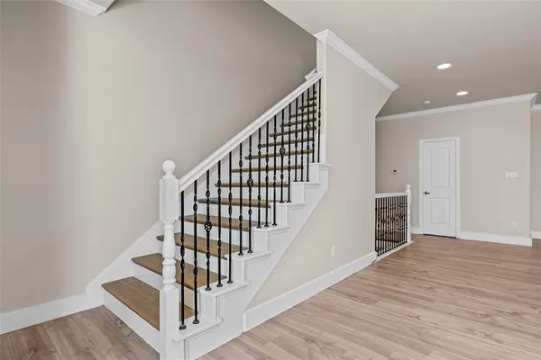a view of entryway with wooden floor