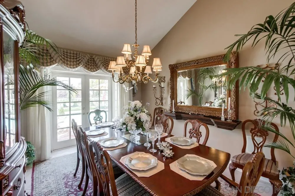 16220 Country Day Road Poway, CA 92064 - Photo 11 of 75 a view of a dining room with furniture and chandelier