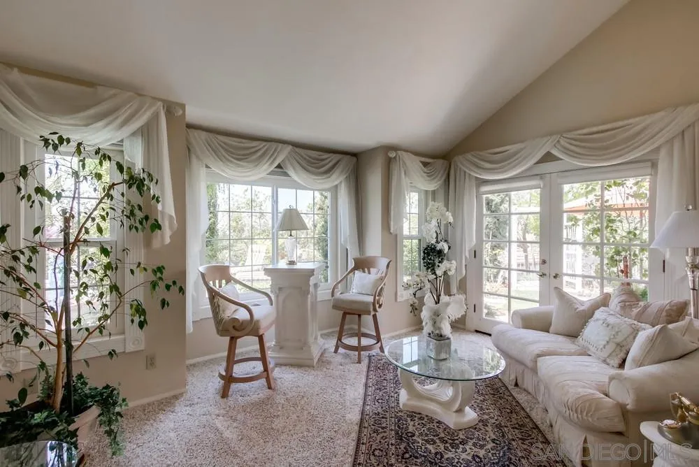 16220 Country Day Road Poway, CA 92064 - Photo 29 of 75 a living room with furniture and a large window
