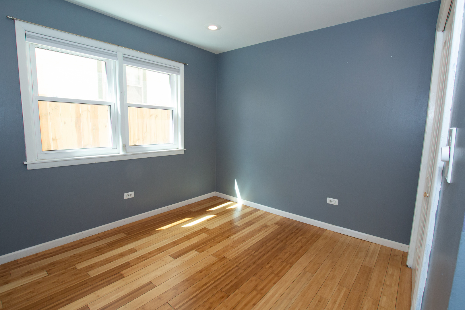 301 Chicago Avenue, Unit 1SW Oak Park, IL 60302 - Photo 9 of 12 a view of empty room with wooden floor