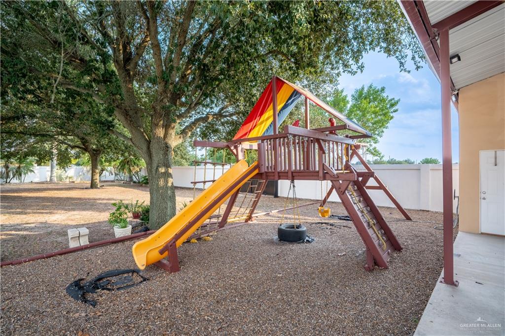 1701 Raul Aguilar Drive Mission, TX 78572 - Photo 26 of 43 a view of a park with a slide