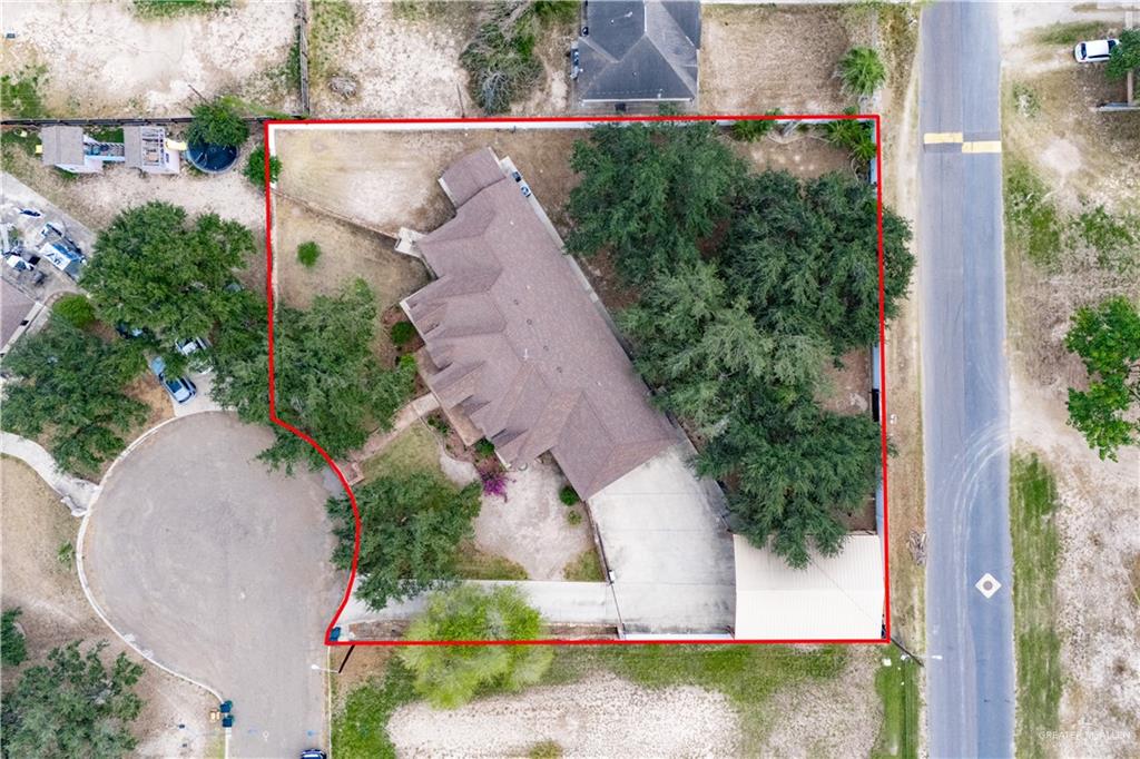 1701 Raul Aguilar Drive Mission, TX 78572 - Photo 33 of 43 an aerial view of a house with garden space and sitting area