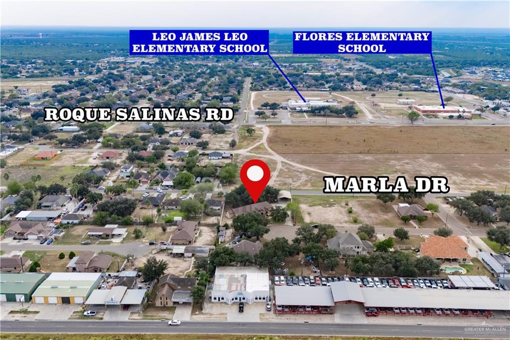 1701 Raul Aguilar Drive Mission, TX 78572 - Photo 38 of 43 a sign that is sitting on a street