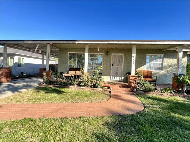 a view of a house with patio outdoor area
