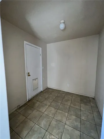 a kitchen with stainless steel appliances a stove microwave and sink