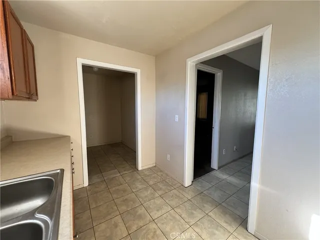 a view of a couches under an umbrella