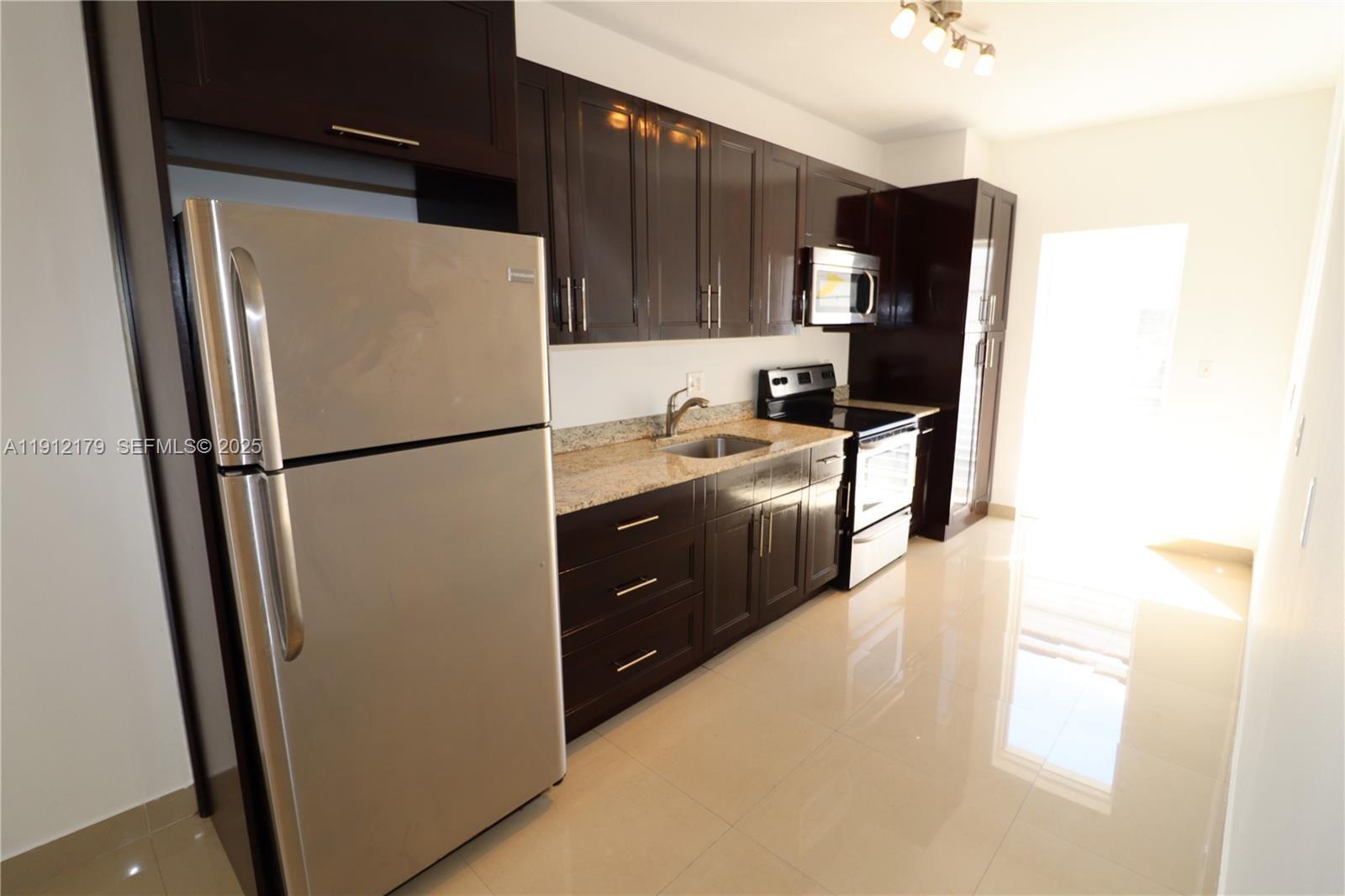 540 74th Street, Unit 14 Miami Beach, FL 33141 - Photo 6 of 32