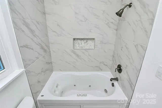 a bathroom with a bathtub
