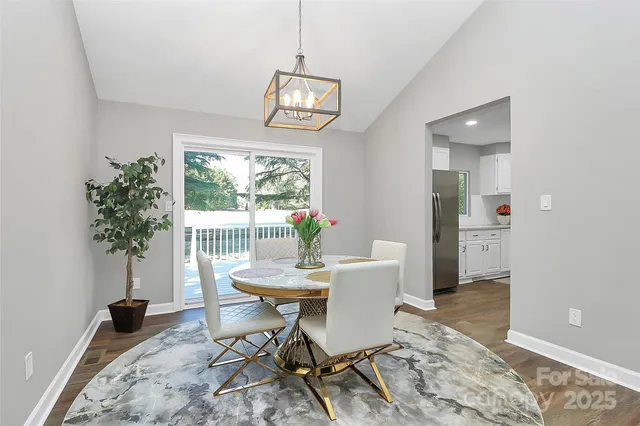 a workspace with furniture window and wooden floor