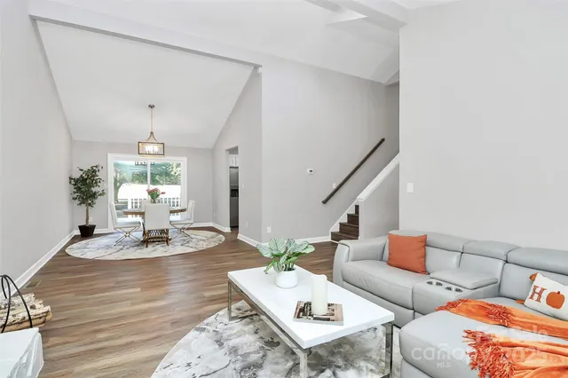 a living room with furniture and window