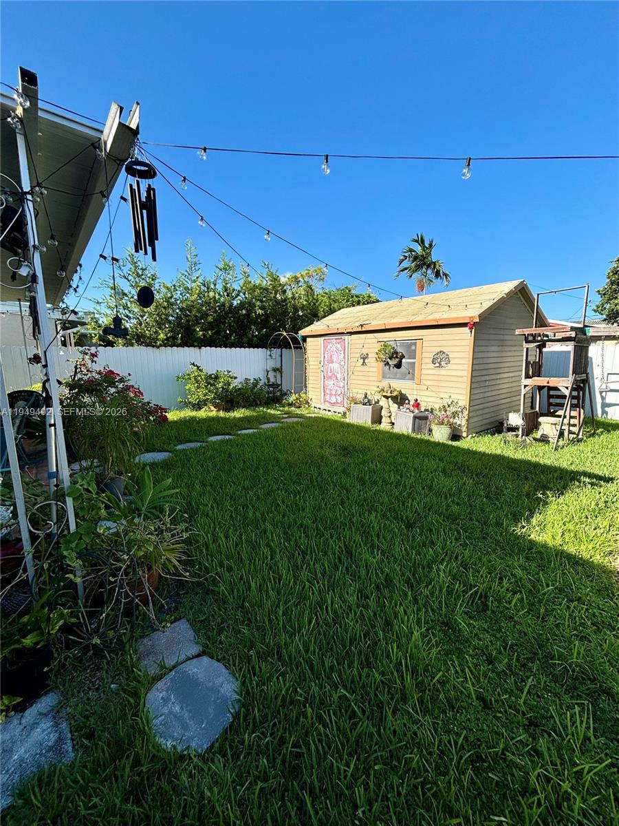 3521 Southwest 88th Court Miami, FL 33165 - Photo 12 of 12 a view of a house with backyard