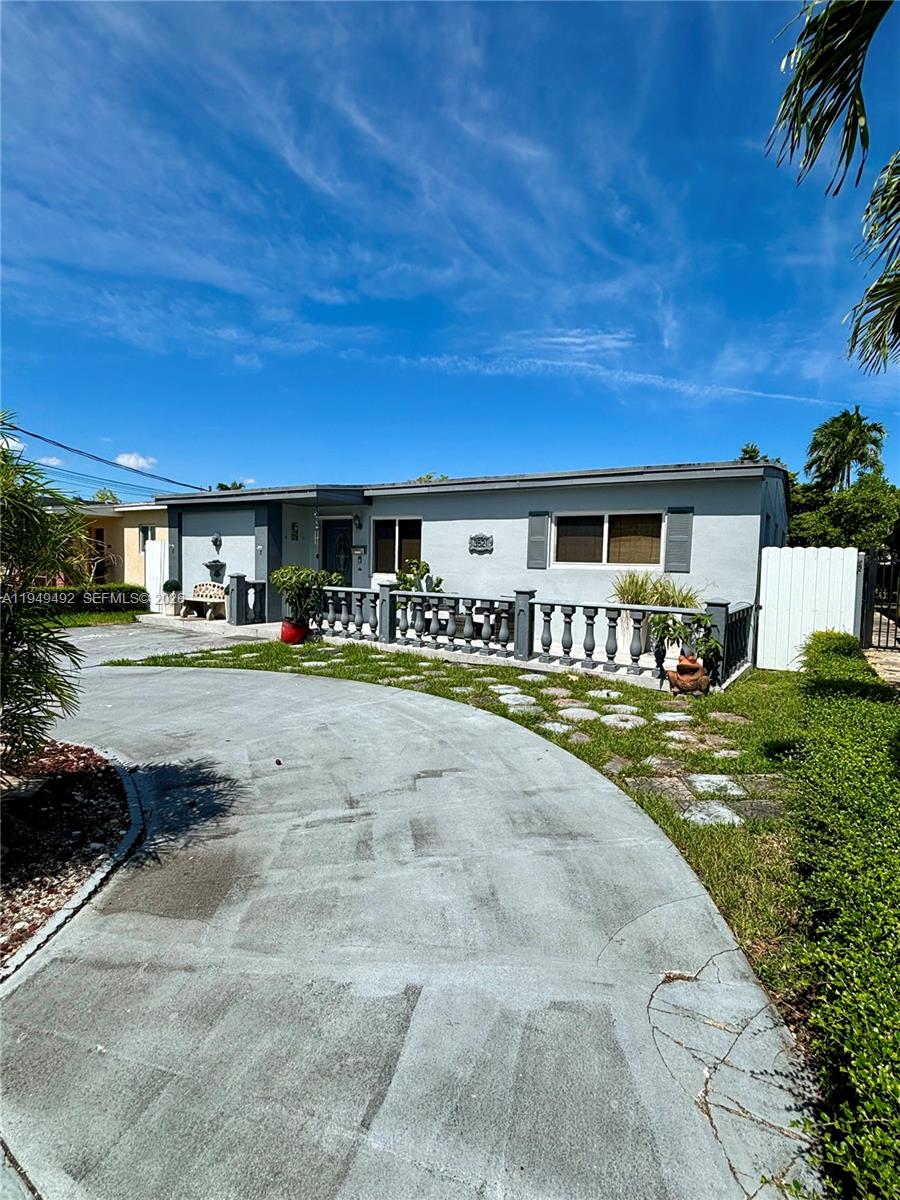 3521 Southwest 88th Court Miami, FL 33165 - Photo 2 of 12 a view of building with outdoor space