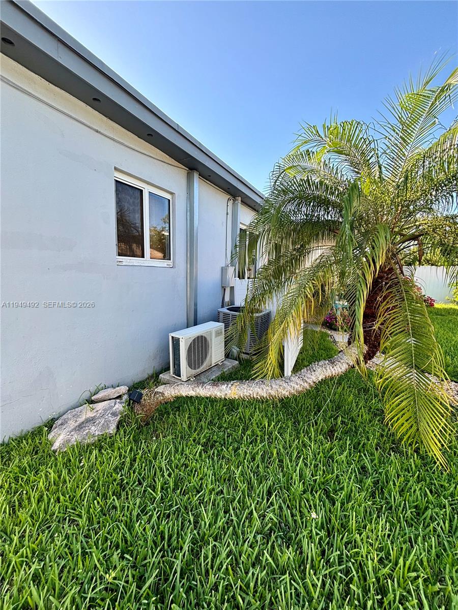 3521 Southwest 88th Court Miami, FL 33165 - Photo 10 of 12 a house view with a garden space