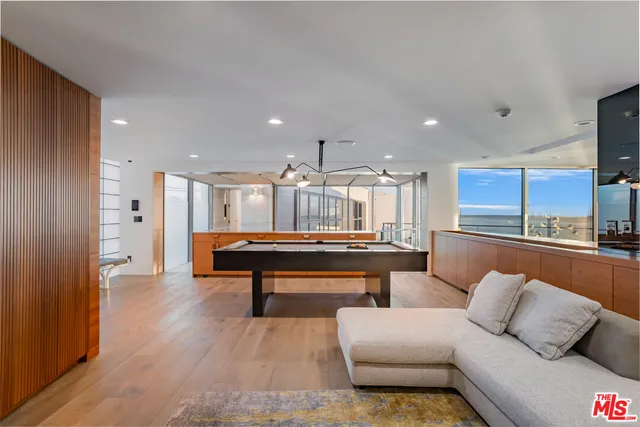 a room with furniture and wooden floor