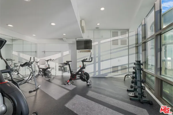 a view of a room with gym equipment