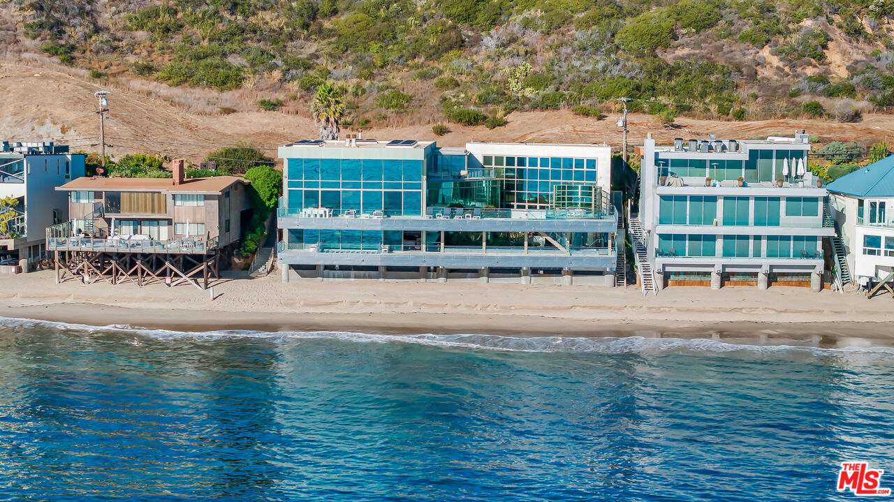 24434 Malibu Road Malibu, CA 90265 - Photo 23 of 29 front view of a house with a yard