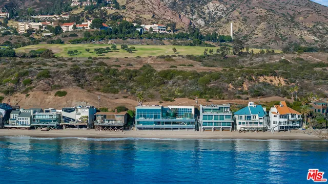 a view of swimming pool with yard and outdoor seating